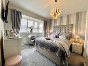 Bedroom One- click for photo gallery